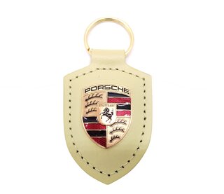 Porte-clés Porsche finition jaune métallisé avec écusson Porsche