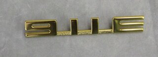 Emblem "911E" gold